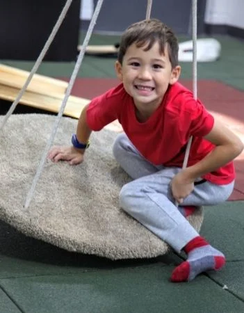 Young boy staring at the camera